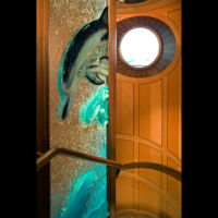 Yacht Detail Dolphins by glass artist Michael Dupille